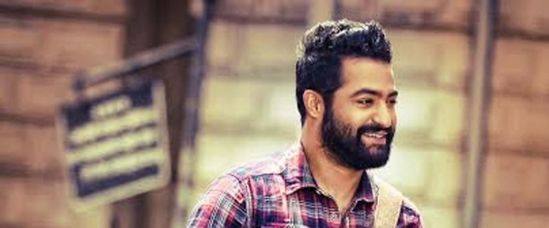 Janatha Garage background 1