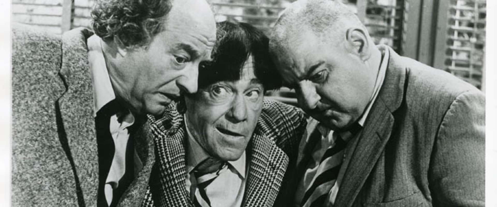The Three Stooges Go Around the World in a Daze background 2