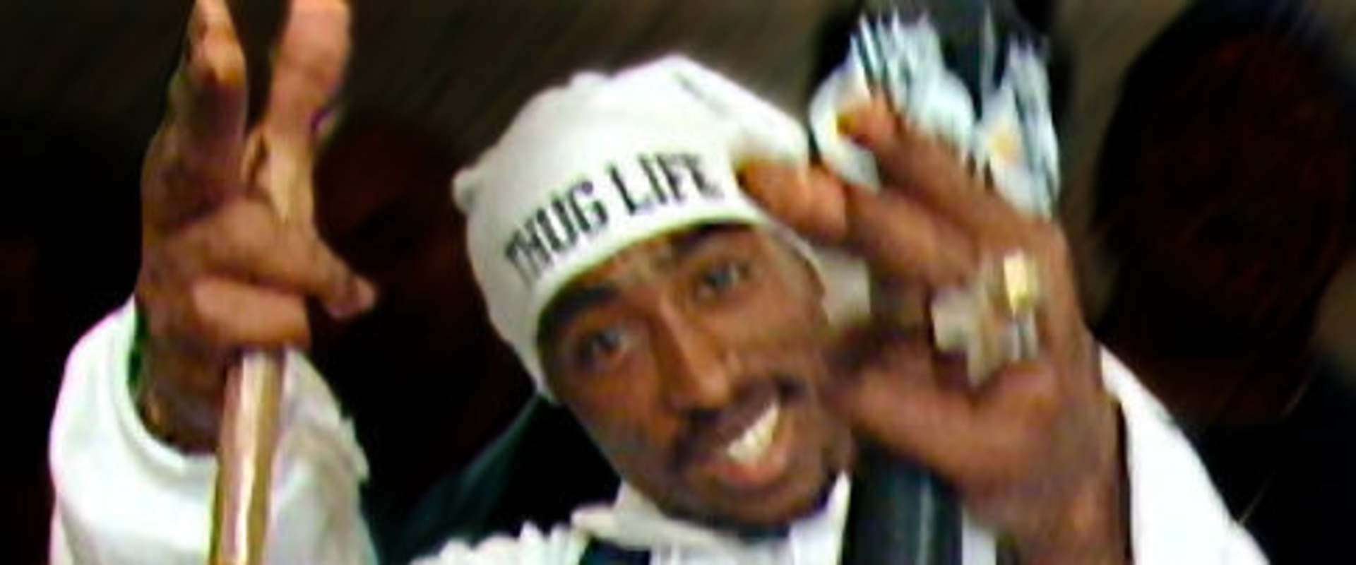Tupac: Resurrection background 2